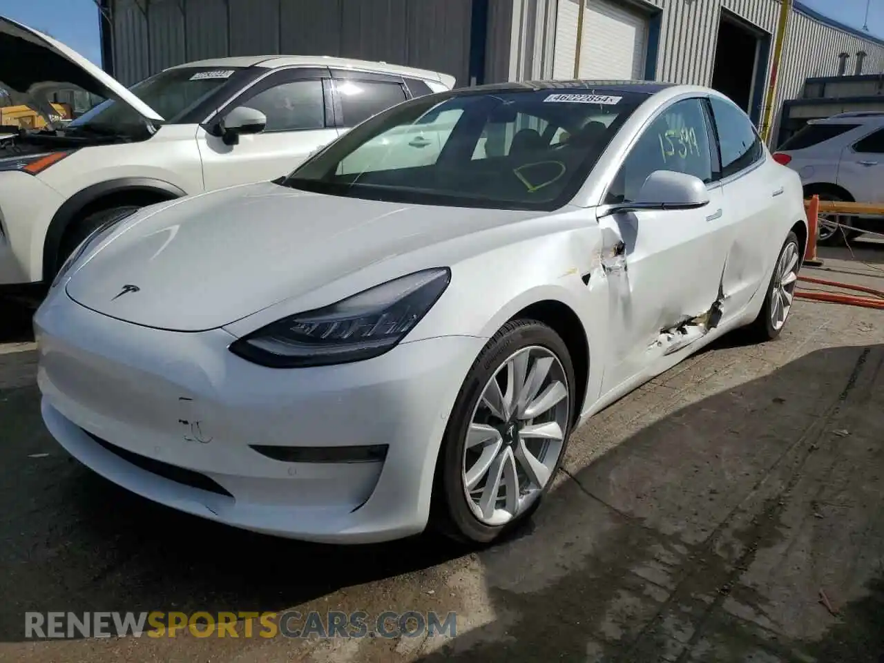 1 Photograph of a damaged car 5YJ3E1EB8LF589111 TESLA MODEL 3 2020