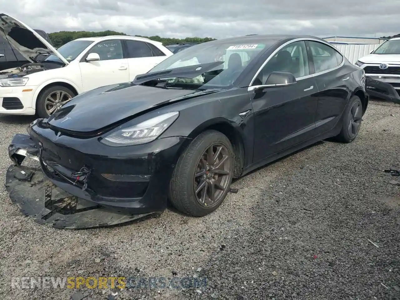 1 Photograph of a damaged car 5YJ3E1EB8LF599475 TESLA MODEL 3 2020