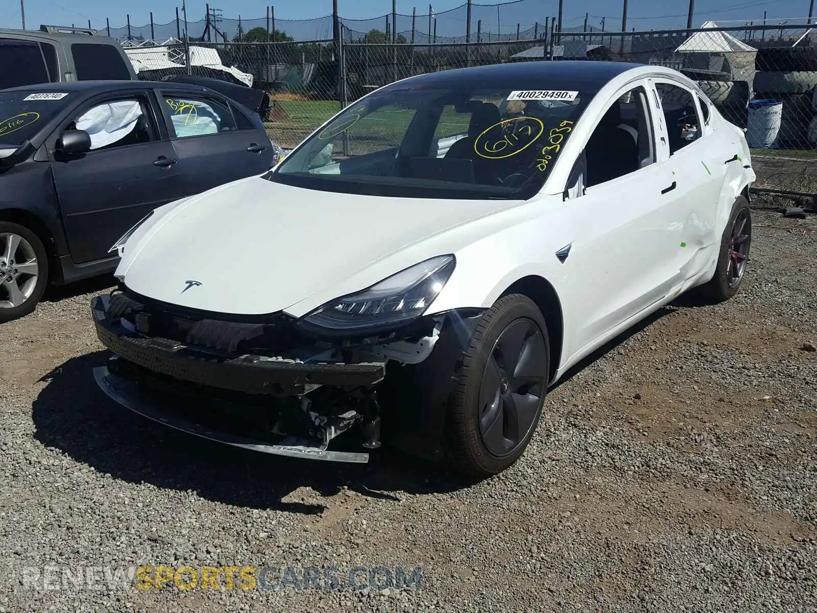 2 Photograph of a damaged car 5YJ3E1EB8LF618879 TESLA MODEL 3 2020
