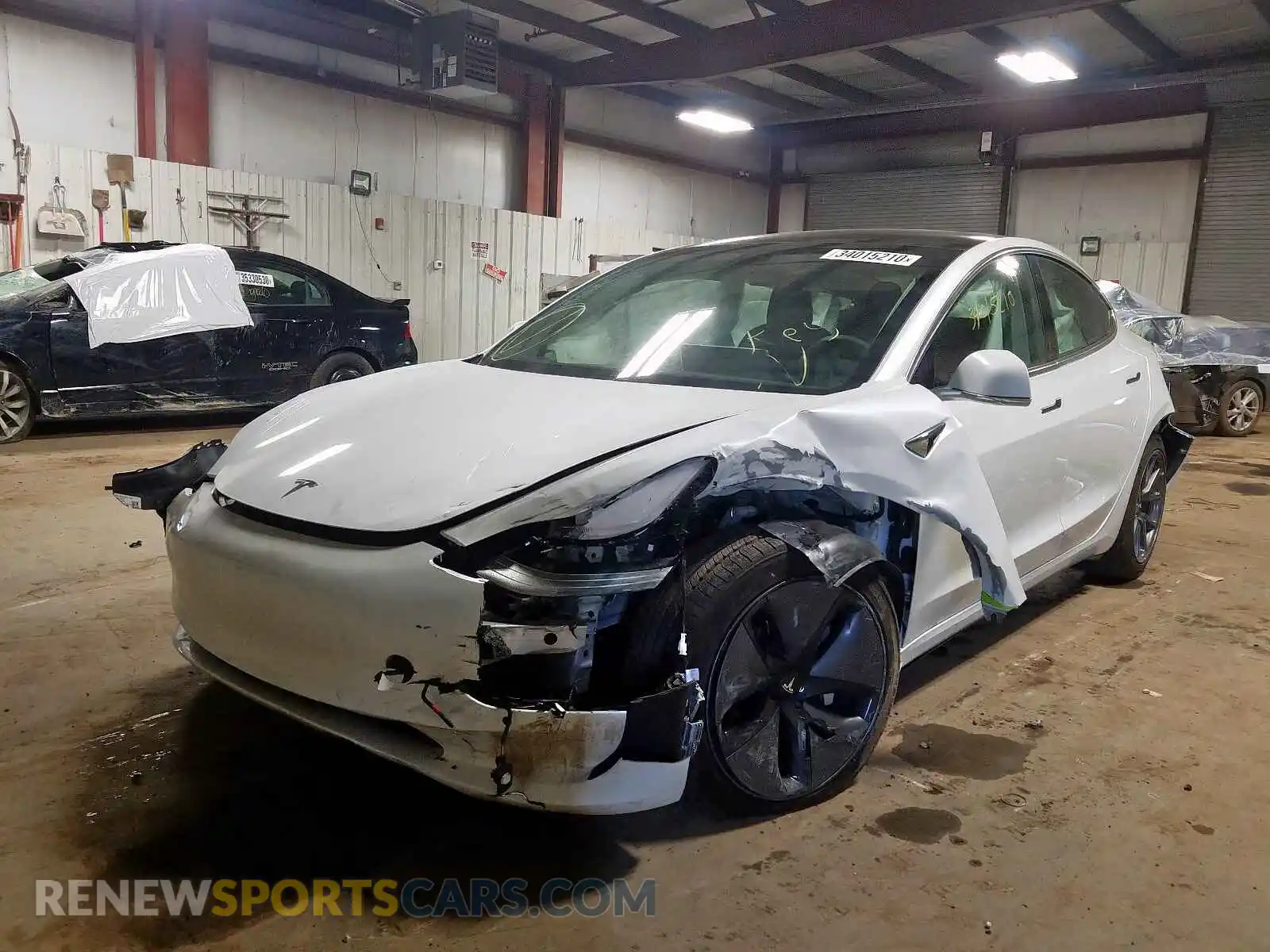 2 Photograph of a damaged car 5YJ3E1EB8LF636685 TESLA MODEL 3 2020