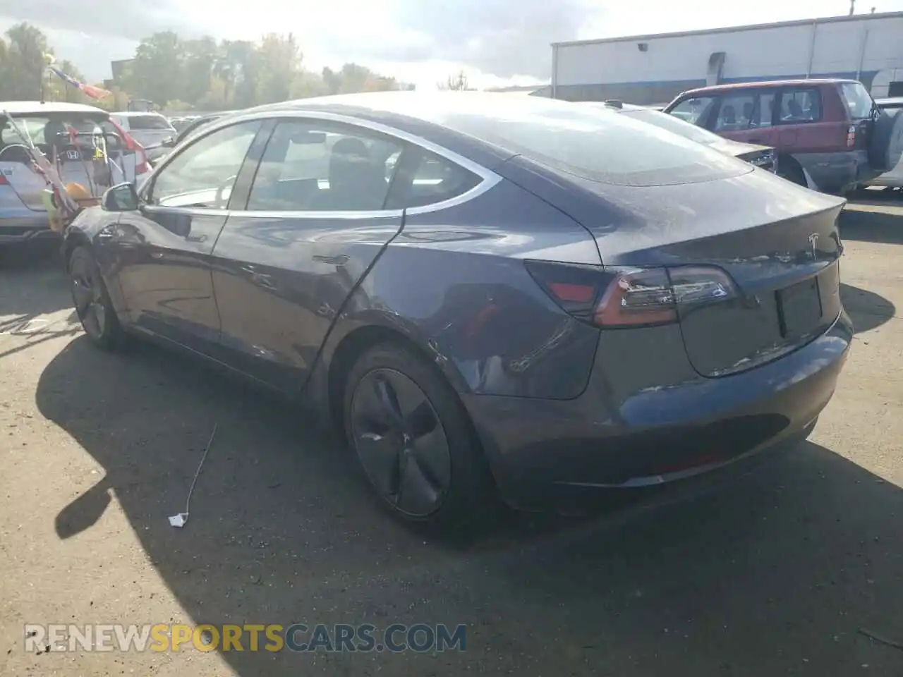 2 Photograph of a damaged car 5YJ3E1EB8LF663501 TESLA MODEL 3 2020