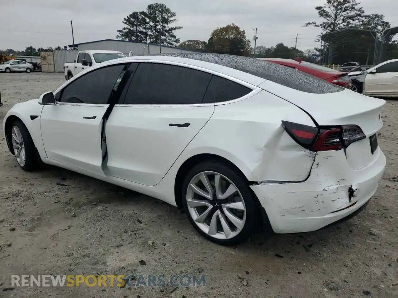 2 Photograph of a damaged car 5YJ3E1EB8LF667483 TESLA MODEL 3 2020