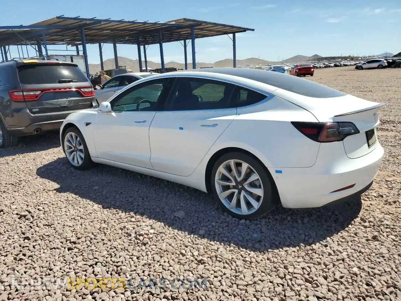 2 Photograph of a damaged car 5YJ3E1EB8LF712308 TESLA MODEL 3 2020