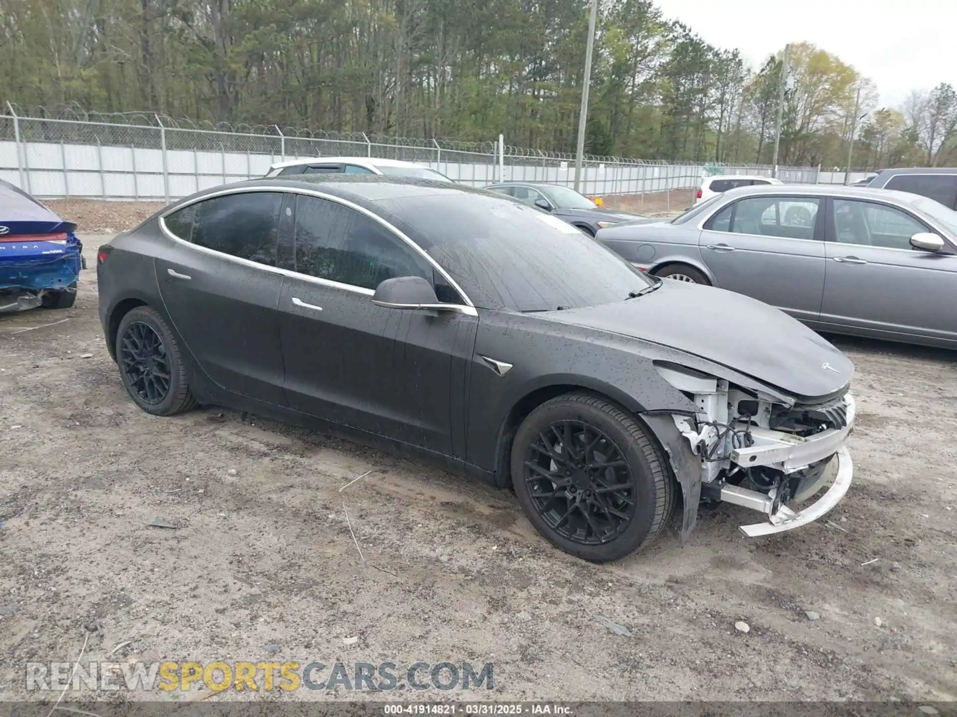 1 Photograph of a damaged car 5YJ3E1EB8LF712583 TESLA MODEL 3 2020