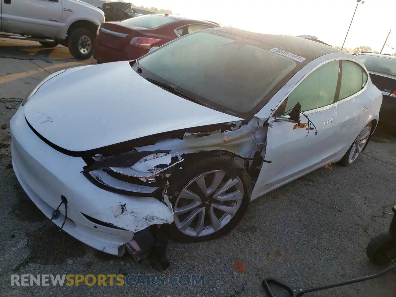 2 Photograph of a damaged car 5YJ3E1EB9LF589070 TESLA MODEL 3 2020