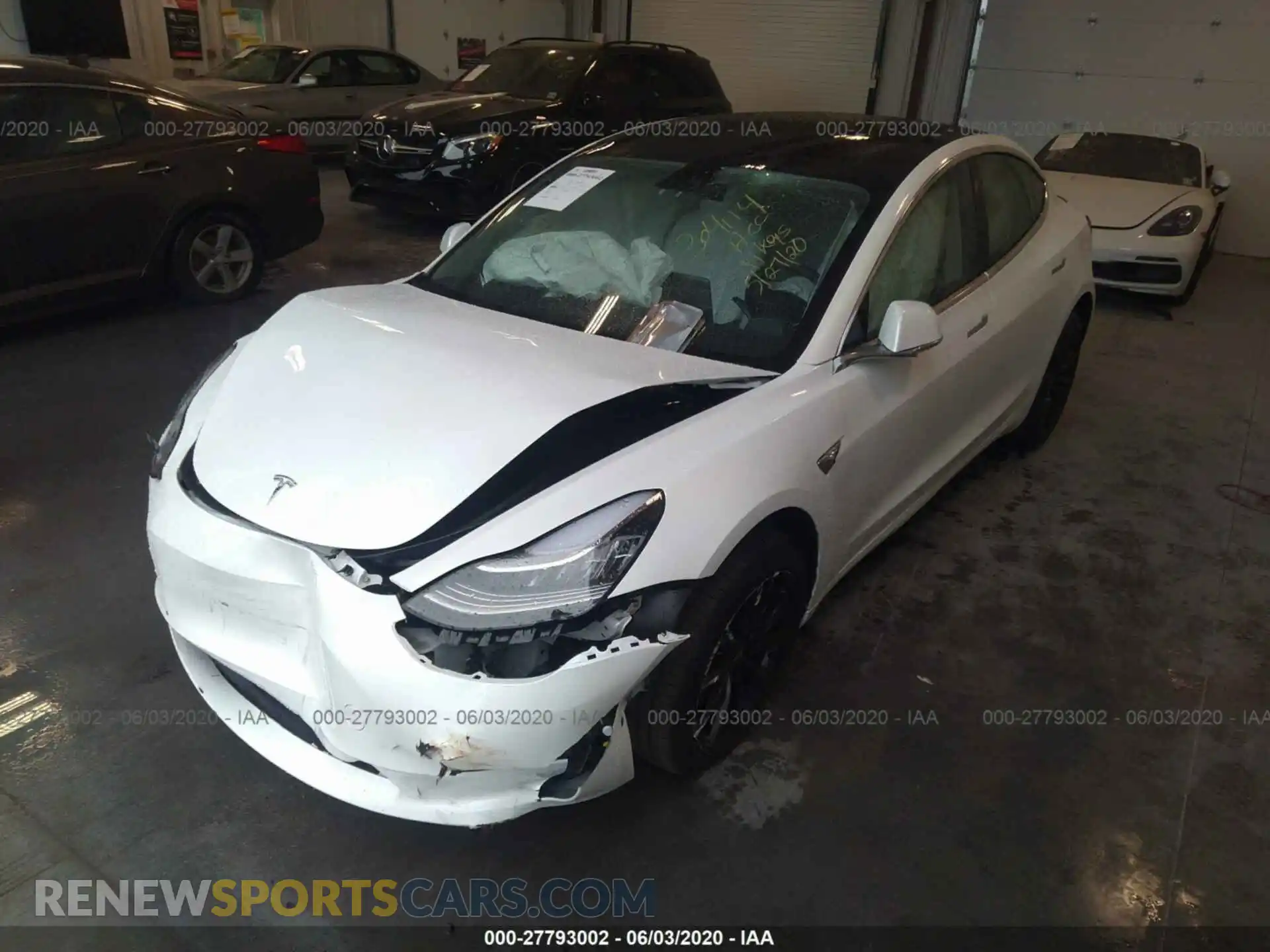 2 Photograph of a damaged car 5YJ3E1EB9LF606949 TESLA MODEL 3 2020