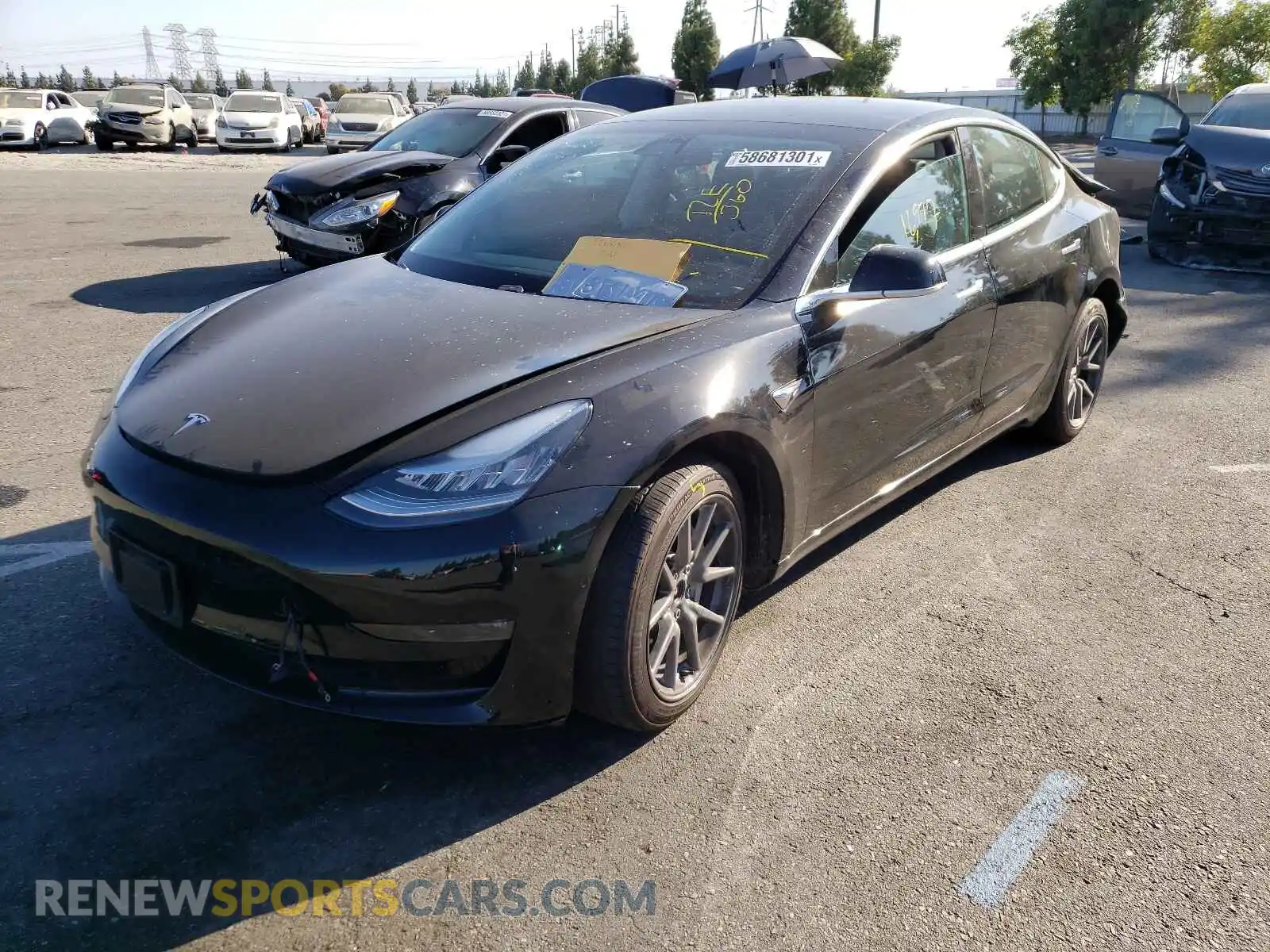 2 Photograph of a damaged car 5YJ3E1EB9LF647422 TESLA MODEL 3 2020