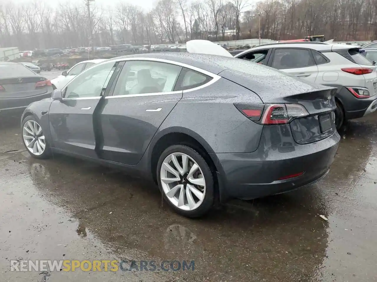 2 Photograph of a damaged car 5YJ3E1EB9LF795991 TESLA MODEL 3 2020