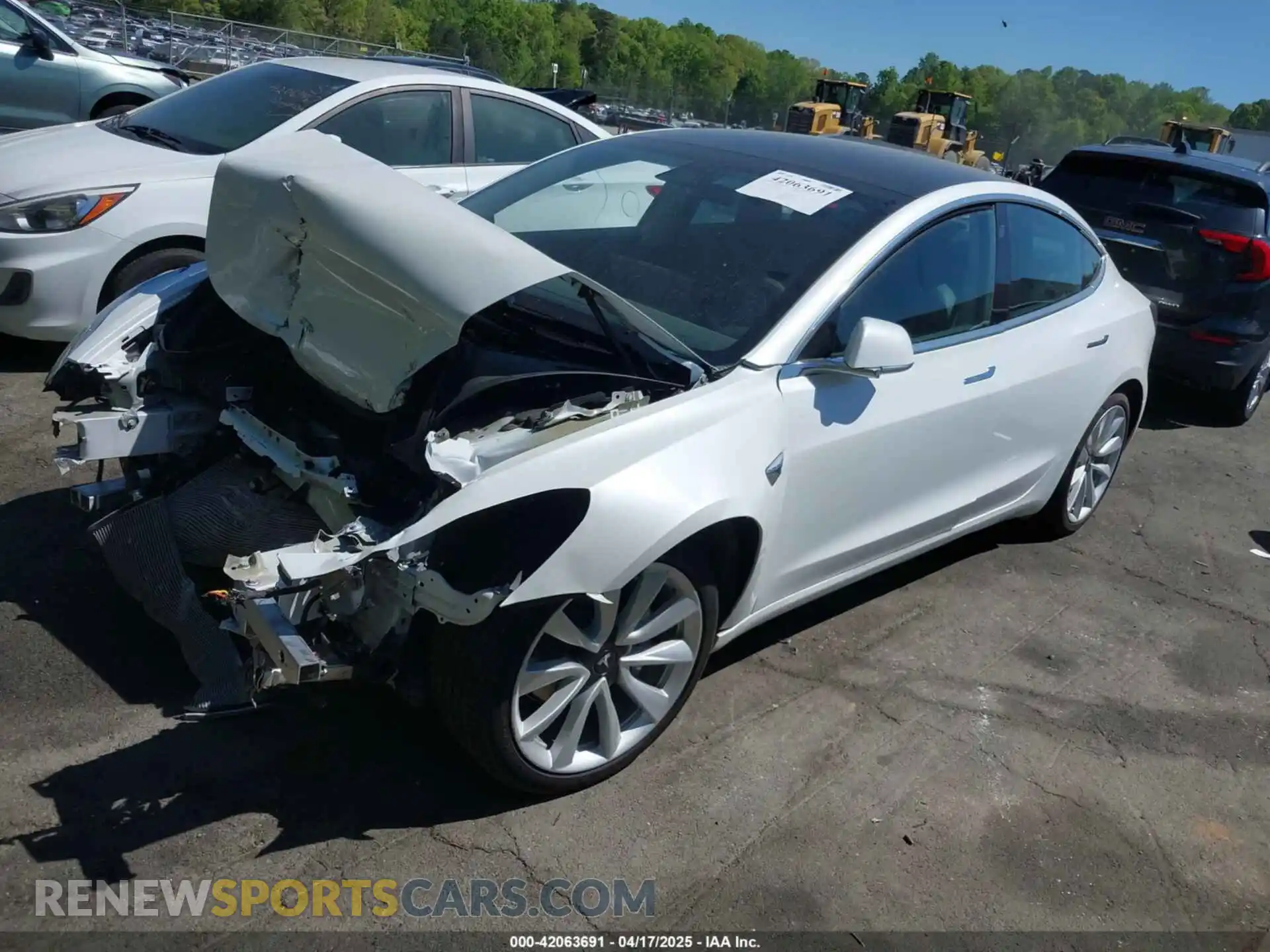 2 Photograph of a damaged car 5YJ3E1EC2LF587069 TESLA MODEL 3 2020
