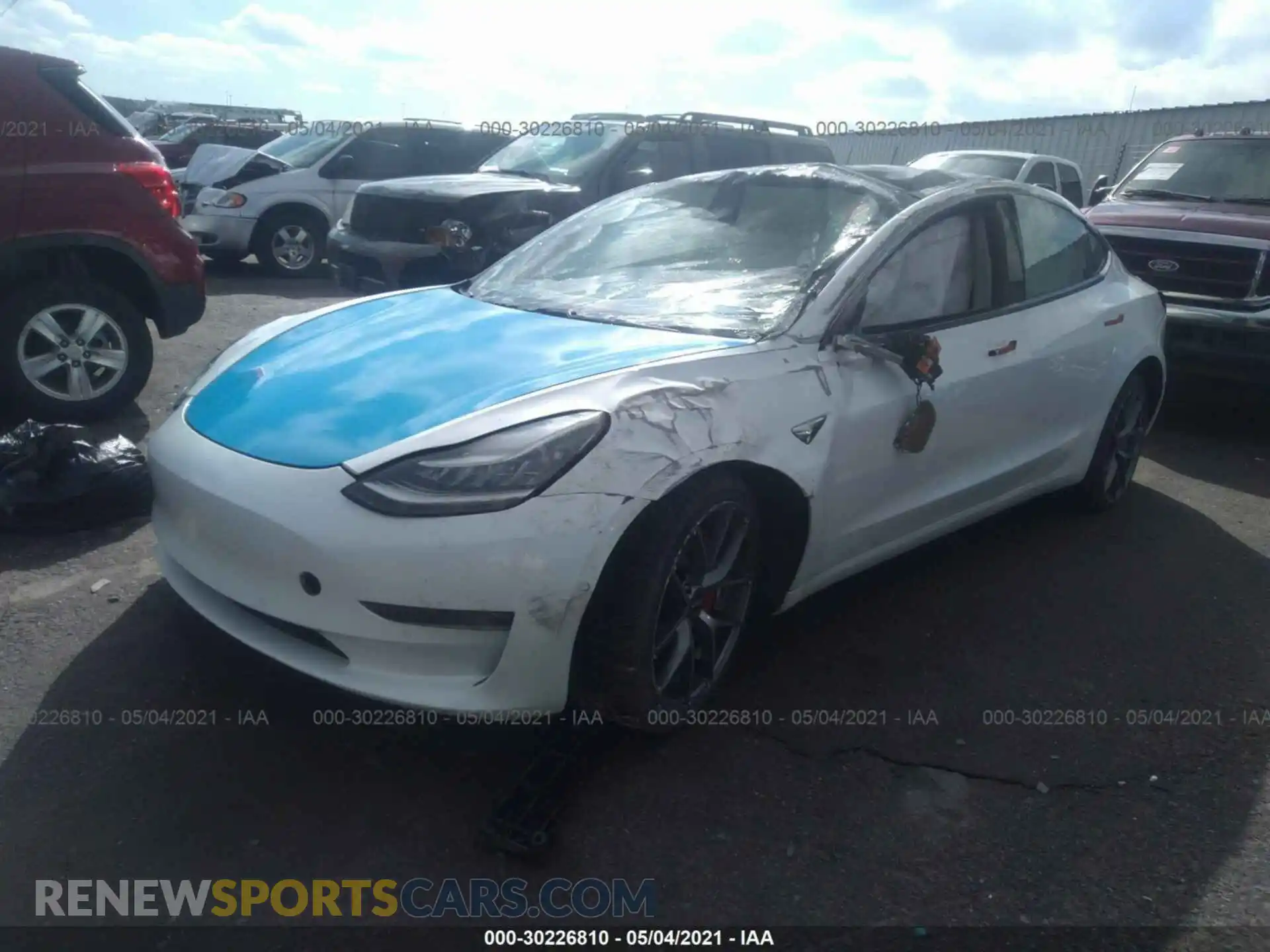 2 Photograph of a damaged car 5YJ3E1EC4LF624963 TESLA MODEL 3 2020