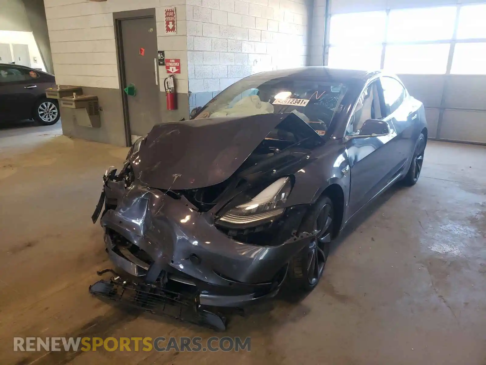 2 fotografías del automóvil dañado 5YJ3E1EC6LF646916 TESLA MODEL 3 2020
