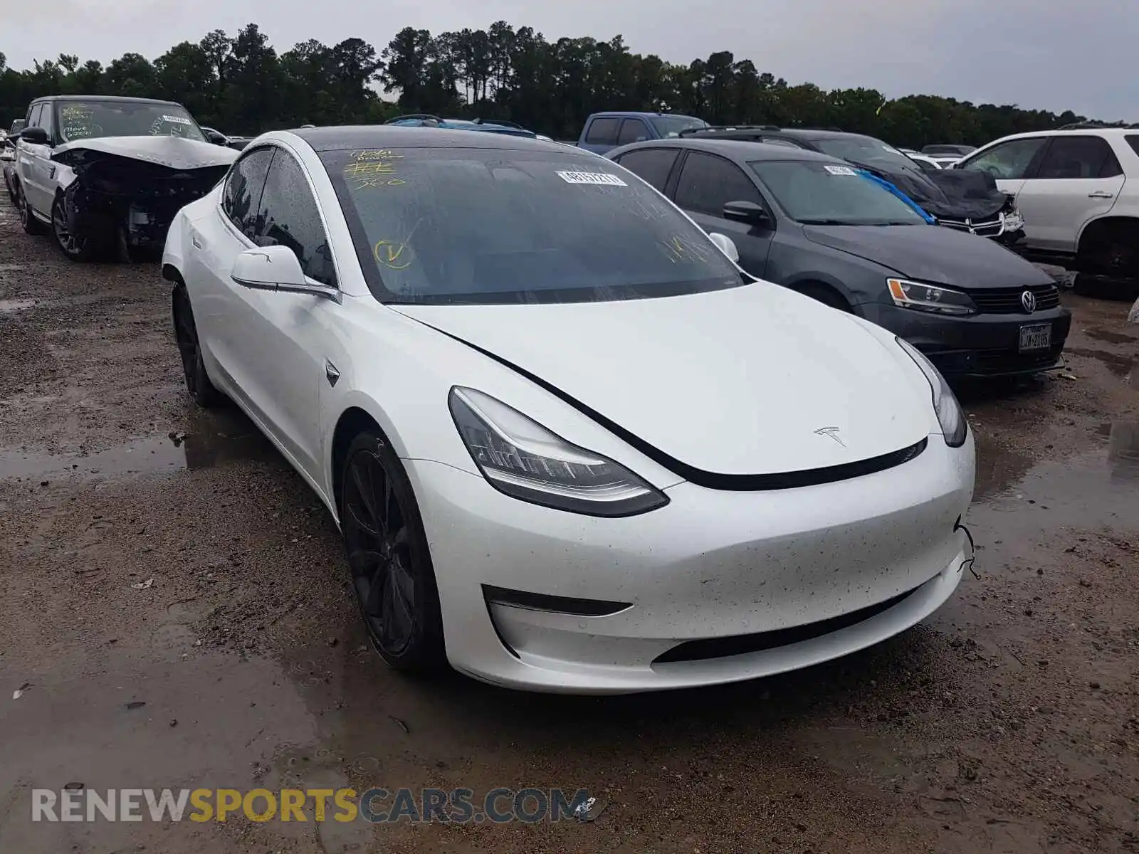 1 Photograph of a damaged car 5YJ3E1EC6LF715068 TESLA MODEL 3 2020