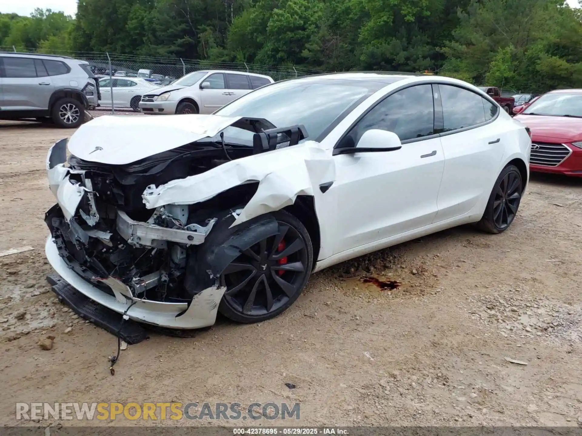 2 Photograph of a damaged car 5YJ3E1EC7LF714303 TESLA MODEL 3 2020
