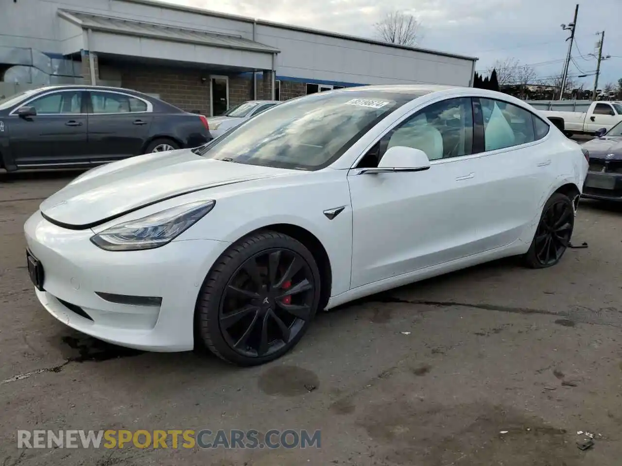 1 Photograph of a damaged car 5YJ3E1EC8LF719235 TESLA MODEL 3 2020