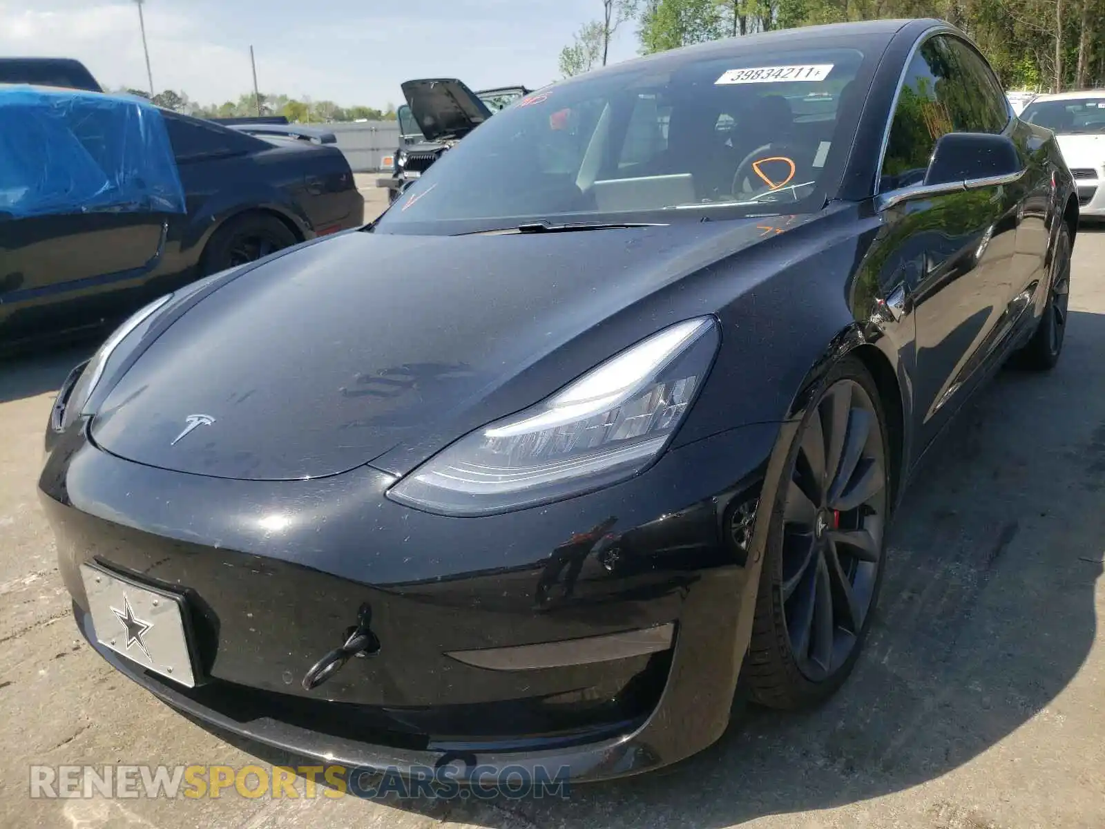 2 Photograph of a damaged car 5YJ3E1EC8LF736102 TESLA MODEL 3 2020