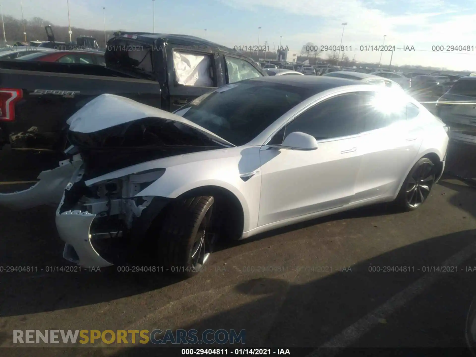 2 Photograph of a damaged car 5YJ3E1EC9LF714321 TESLA MODEL 3 2020