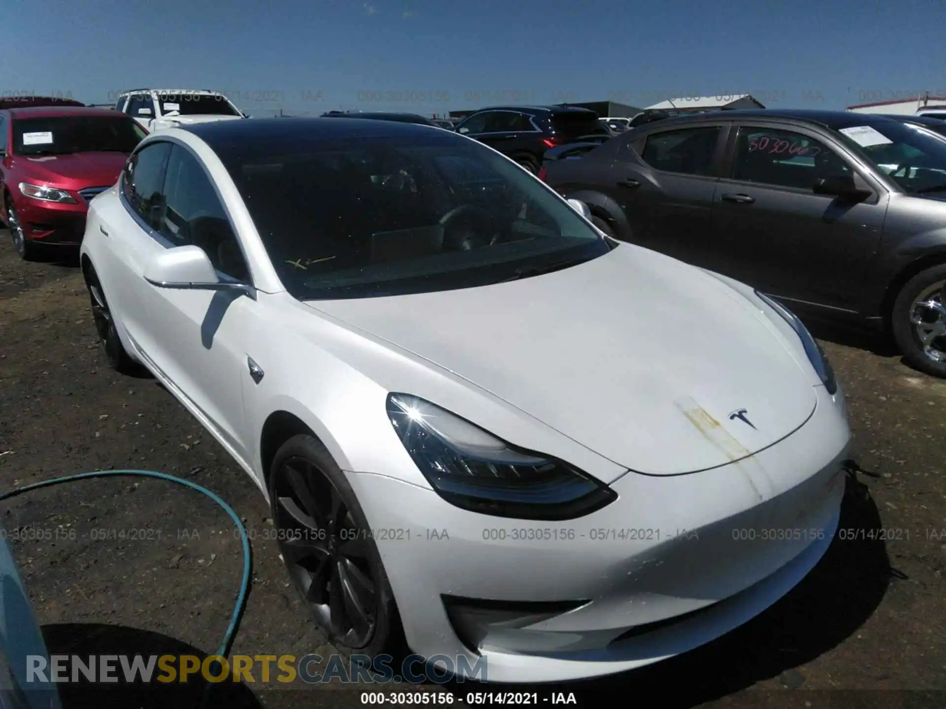 1 Photograph of a damaged car 5YJ3E1ECXLF623963 TESLA MODEL 3 2020