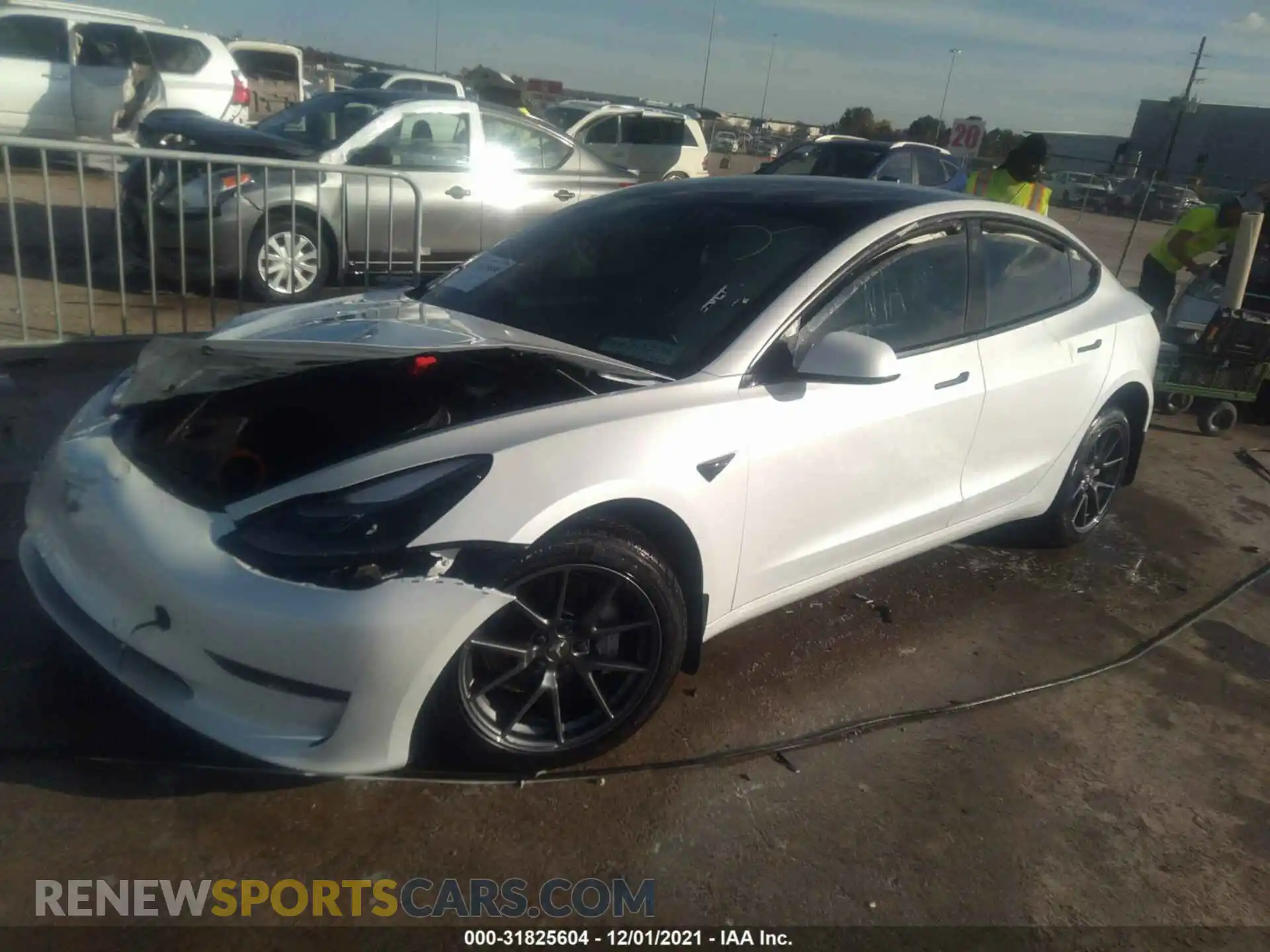 2 Photograph of a damaged car 5YJ3E1EA0MF018608 TESLA MODEL 3 2021