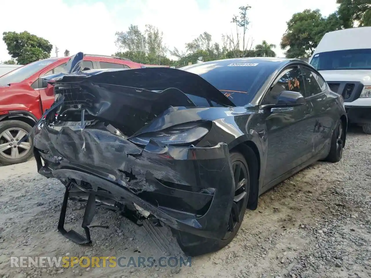 2 Photograph of a damaged car 5YJ3E1EA0MF084995 TESLA MODEL 3 2021