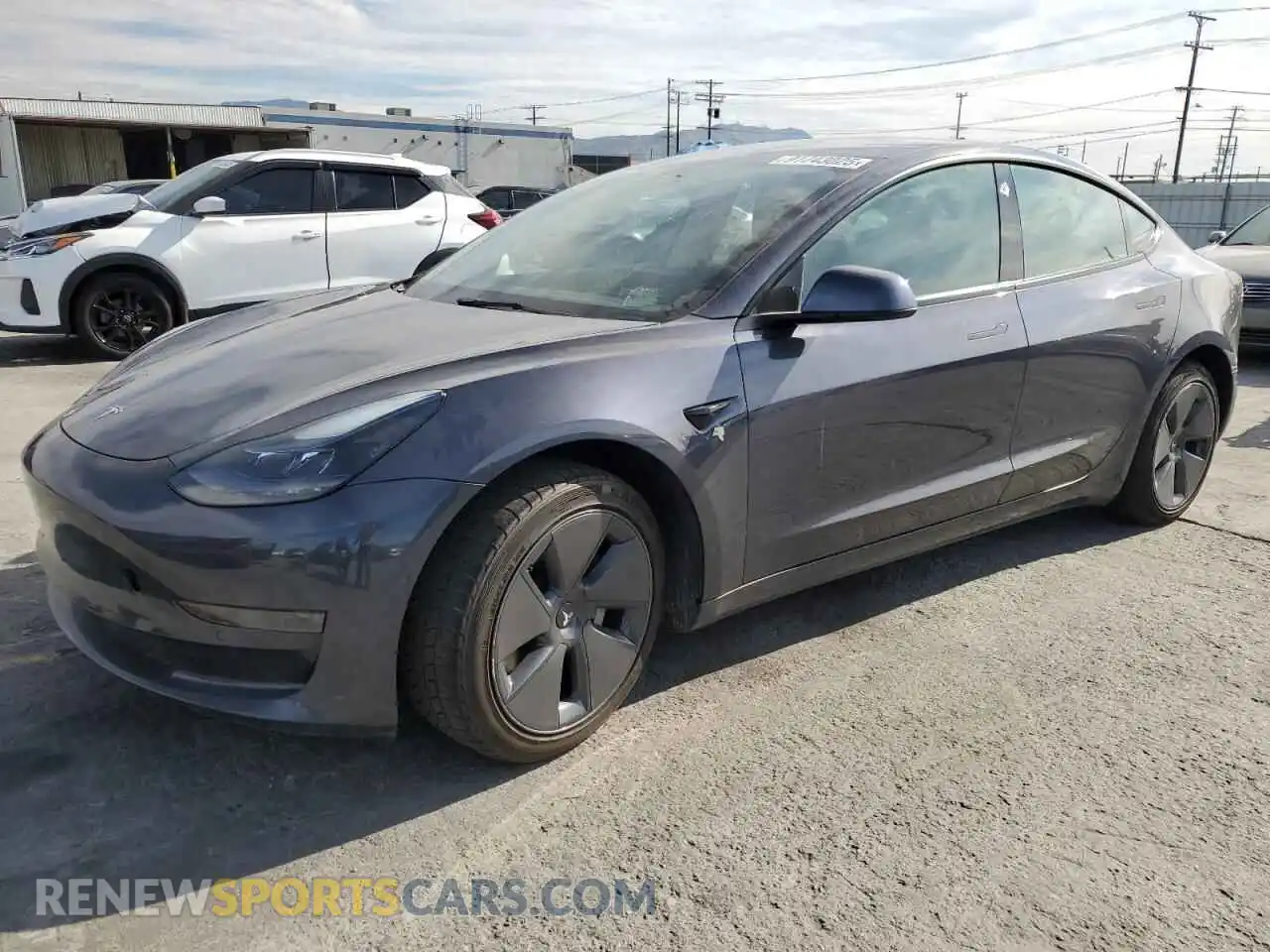 1 Photograph of a damaged car 5YJ3E1EA0MF092143 TESLA MODEL 3 2021