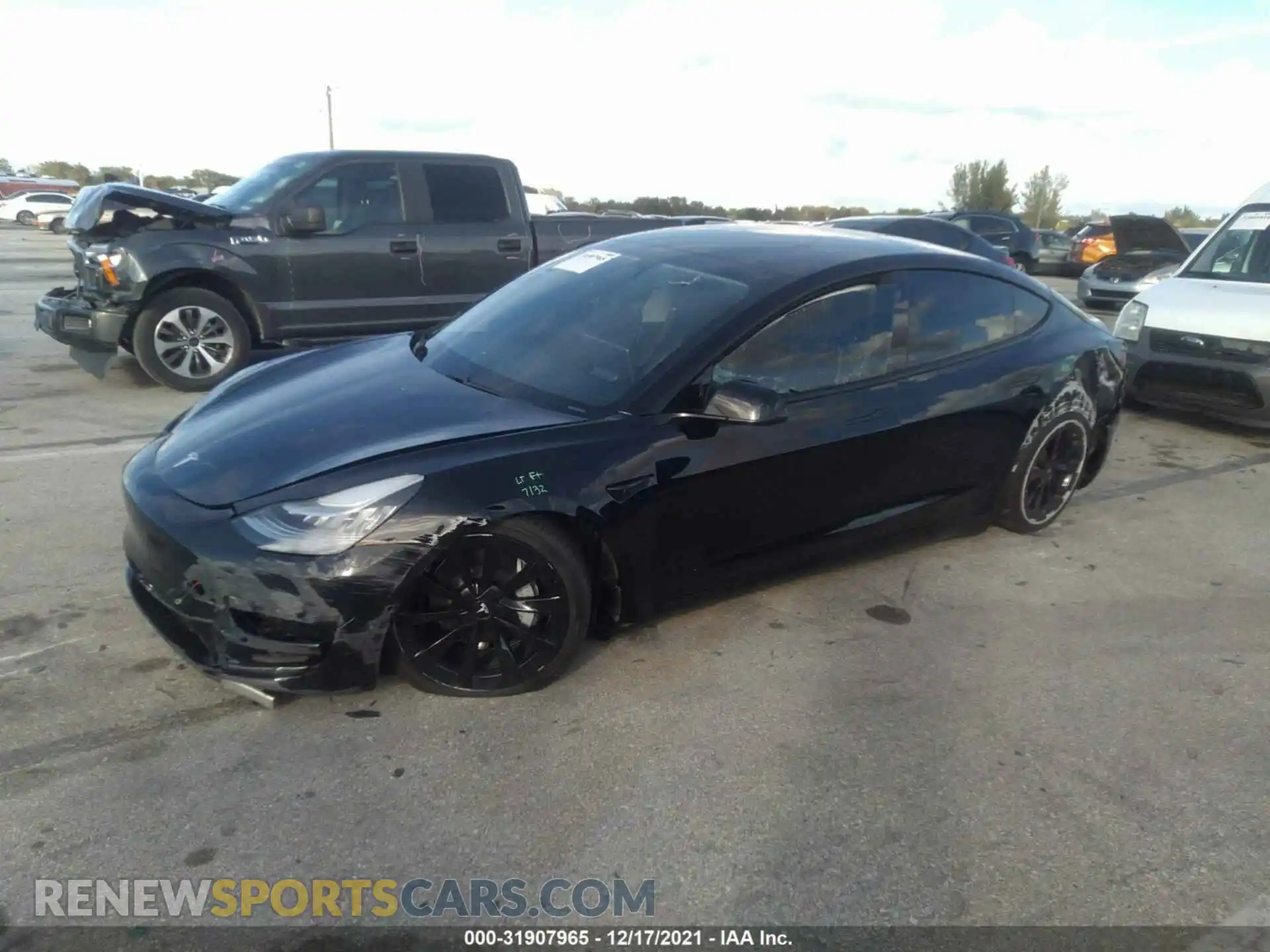 2 fotografías del automóvil dañado 5YJ3E1EA0MF851227 TESLA MODEL 3 2021