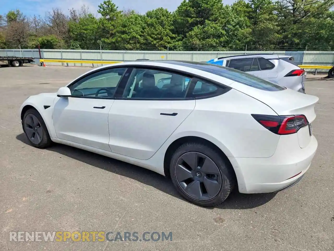 2 fotografías del automóvil dañado 5YJ3E1EA0MF851972 TESLA MODEL 3 2021