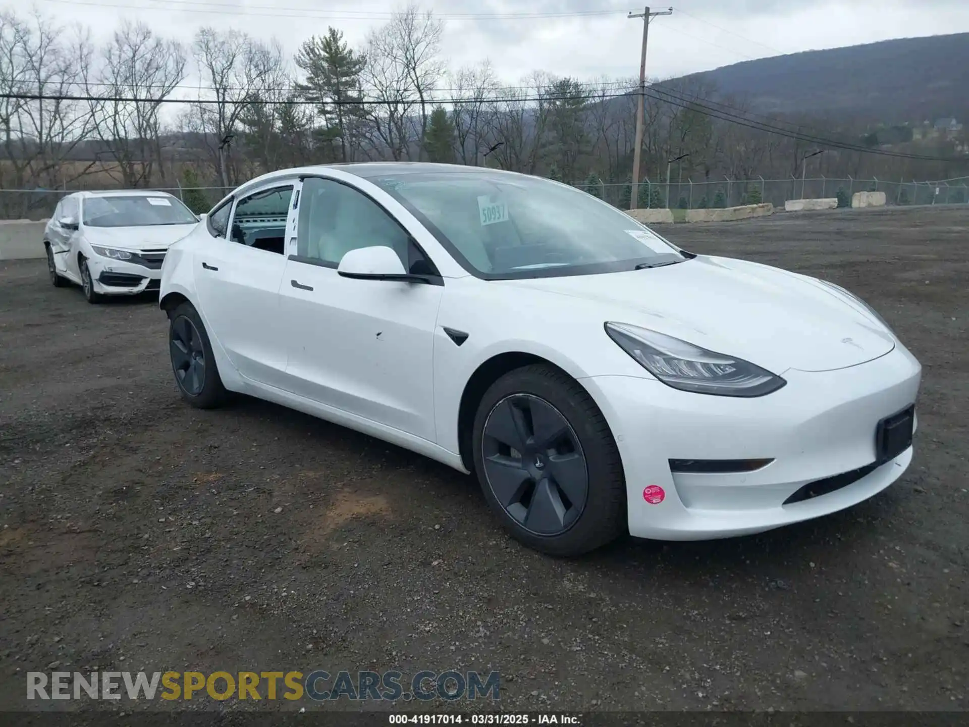 1 Photograph of a damaged car 5YJ3E1EA0MF857397 TESLA MODEL 3 2021