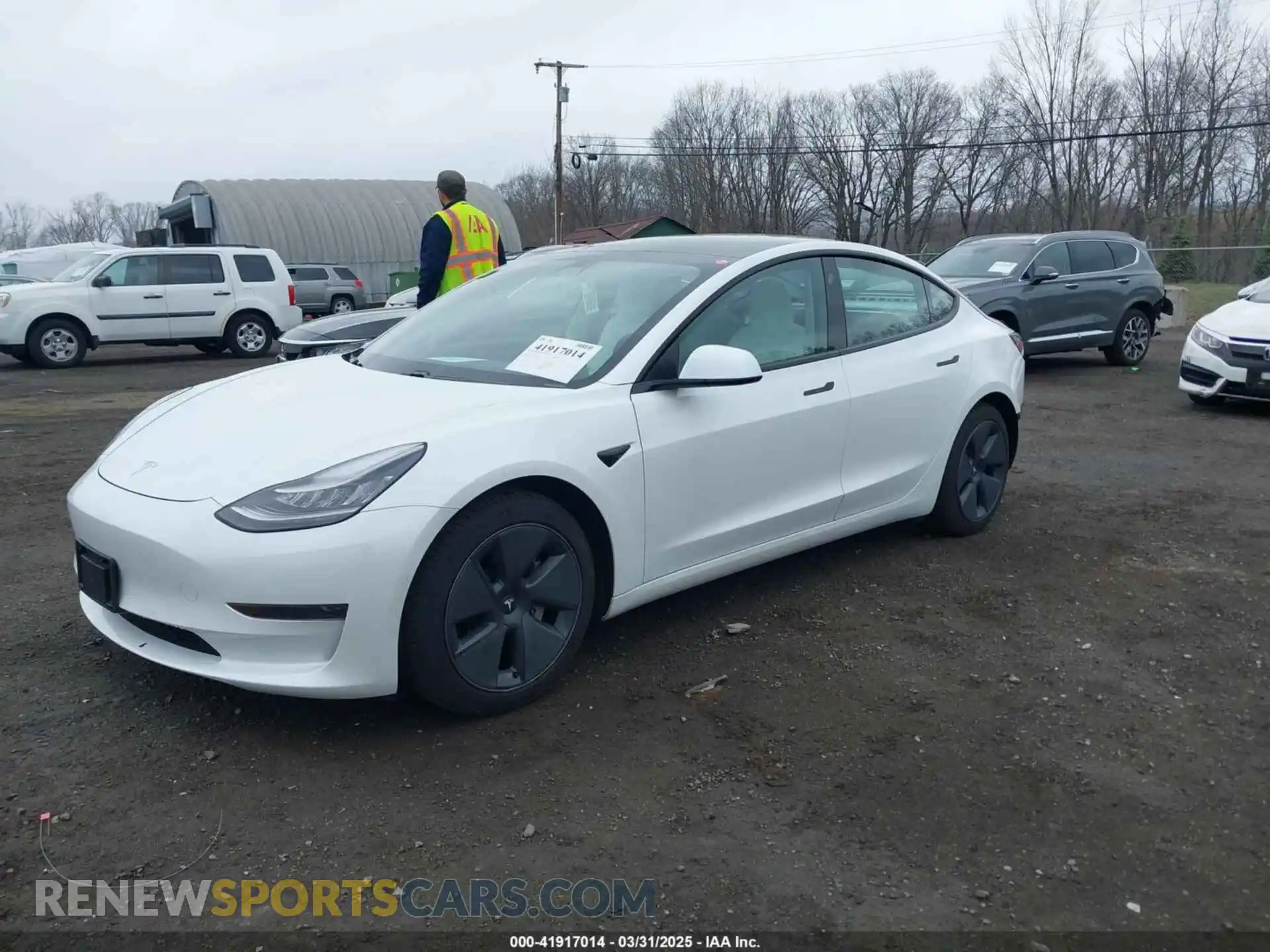 2 Photograph of a damaged car 5YJ3E1EA0MF857397 TESLA MODEL 3 2021