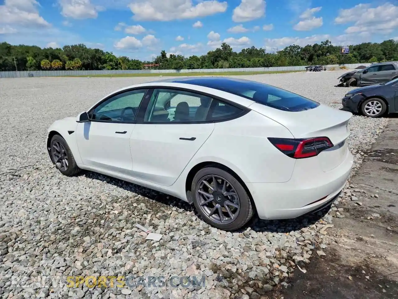 2 Photograph of a damaged car 5YJ3E1EA0MF859876 TESLA MODEL 3 2021
