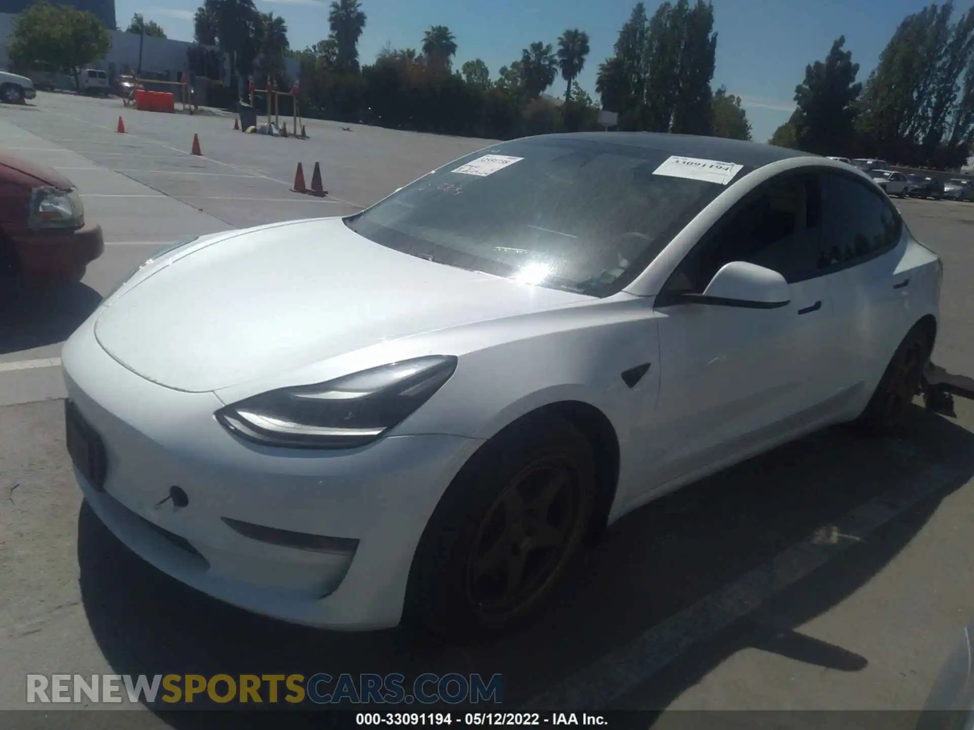 2 Photograph of a damaged car 5YJ3E1EA0MF874183 TESLA MODEL 3 2021