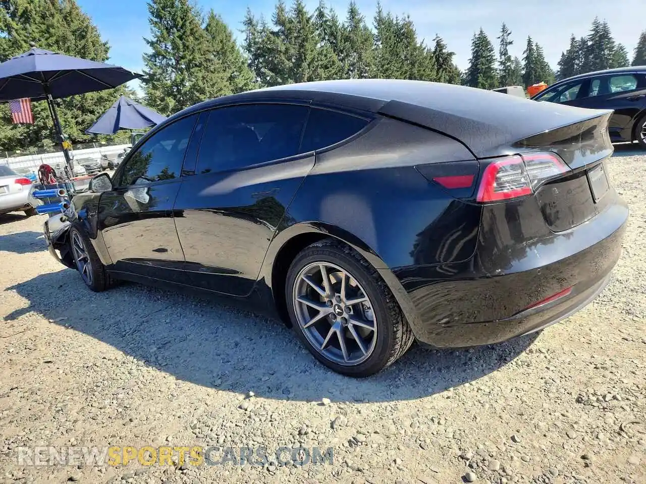 2 Photograph of a damaged car 5YJ3E1EA0MF908347 TESLA MODEL 3 2021