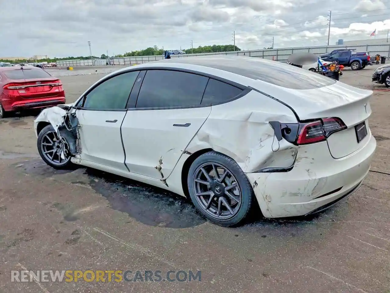 2 fotografías del automóvil dañado 5YJ3E1EA0MF915346 TESLA MODEL 3 2021