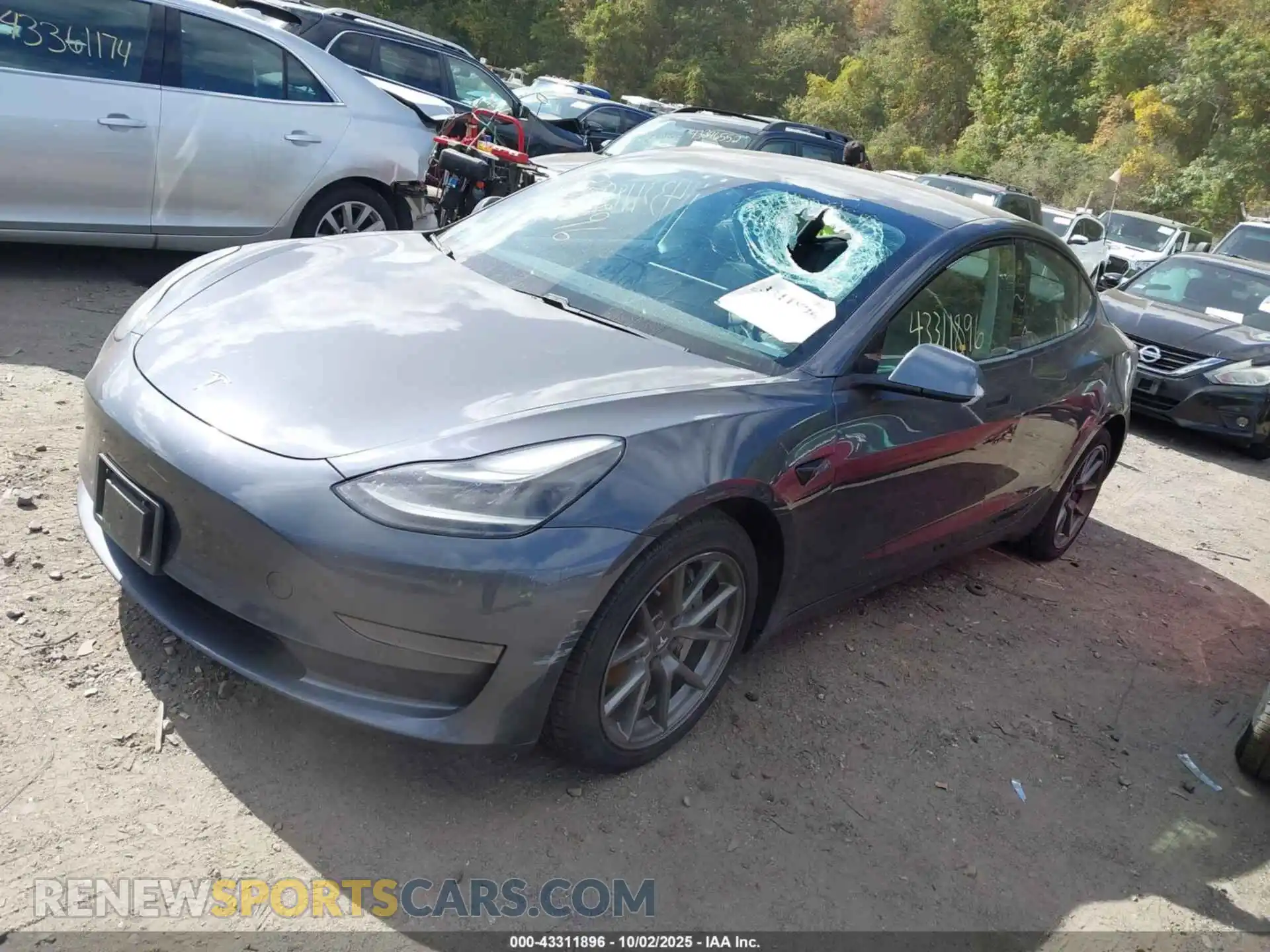 2 Photograph of a damaged car 5YJ3E1EA0MF922443 TESLA MODEL 3 2021