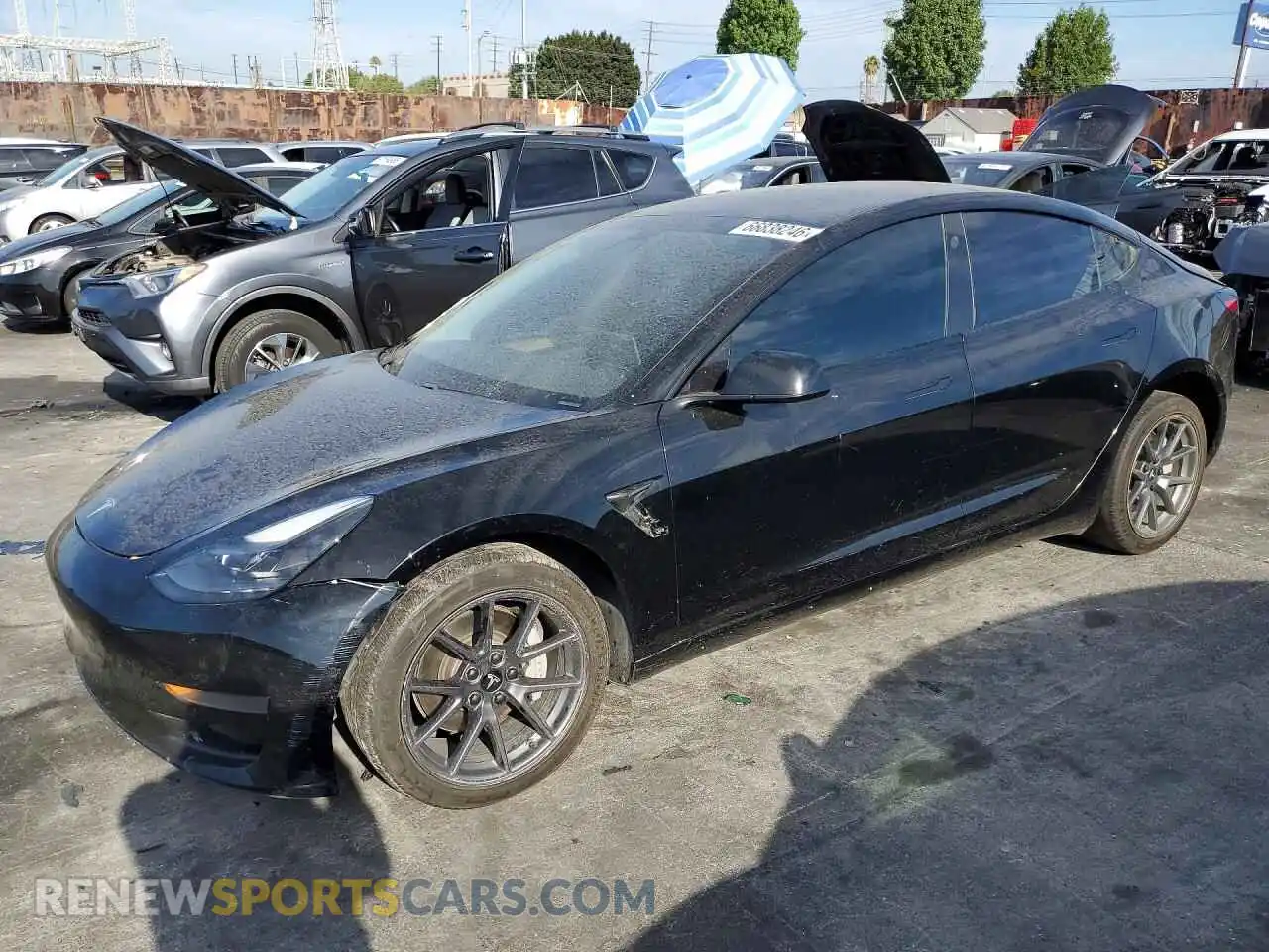 1 Photograph of a damaged car 5YJ3E1EA0MF986787 TESLA MODEL 3 2021