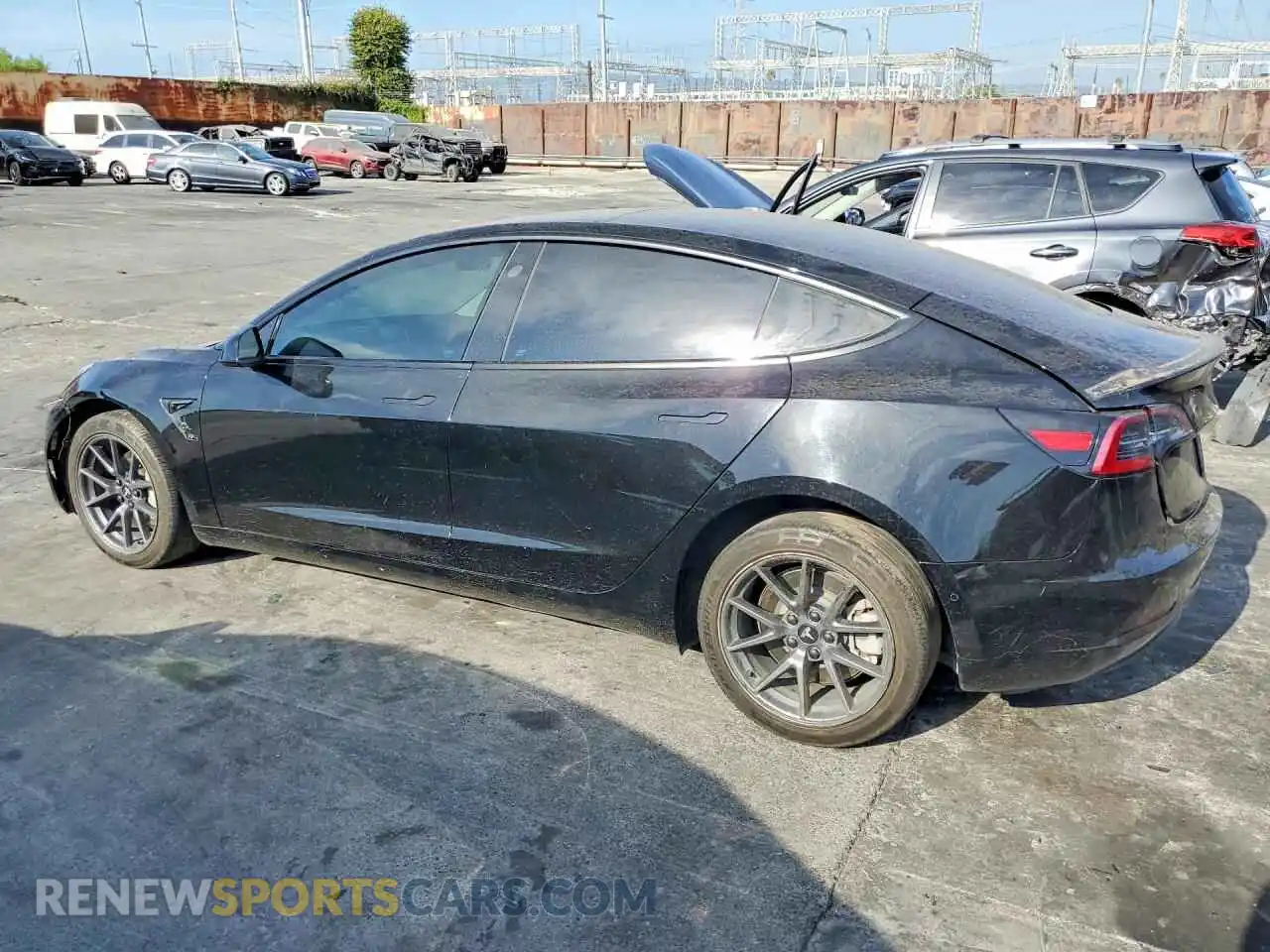 2 Photograph of a damaged car 5YJ3E1EA0MF986787 TESLA MODEL 3 2021