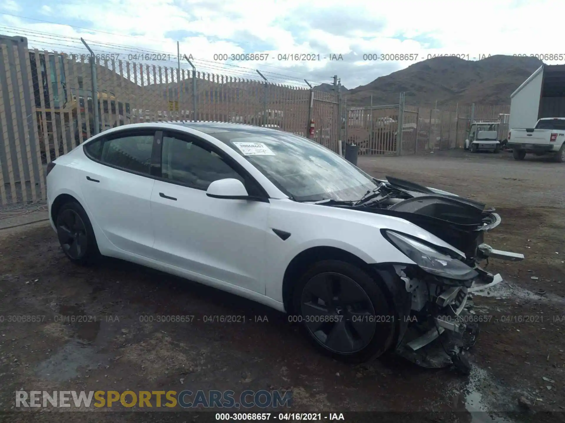 1 Photograph of a damaged car 5YJ3E1EA1MF878713 TESLA MODEL 3 2021