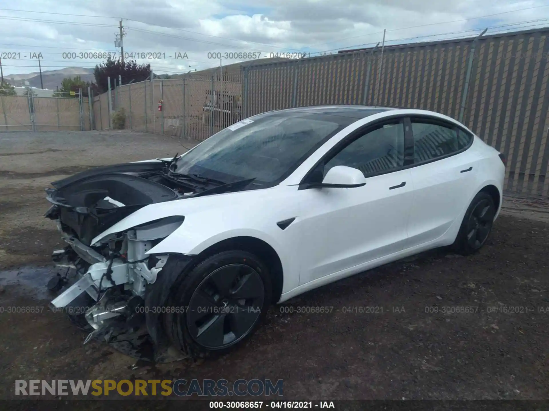 2 Photograph of a damaged car 5YJ3E1EA1MF878713 TESLA MODEL 3 2021