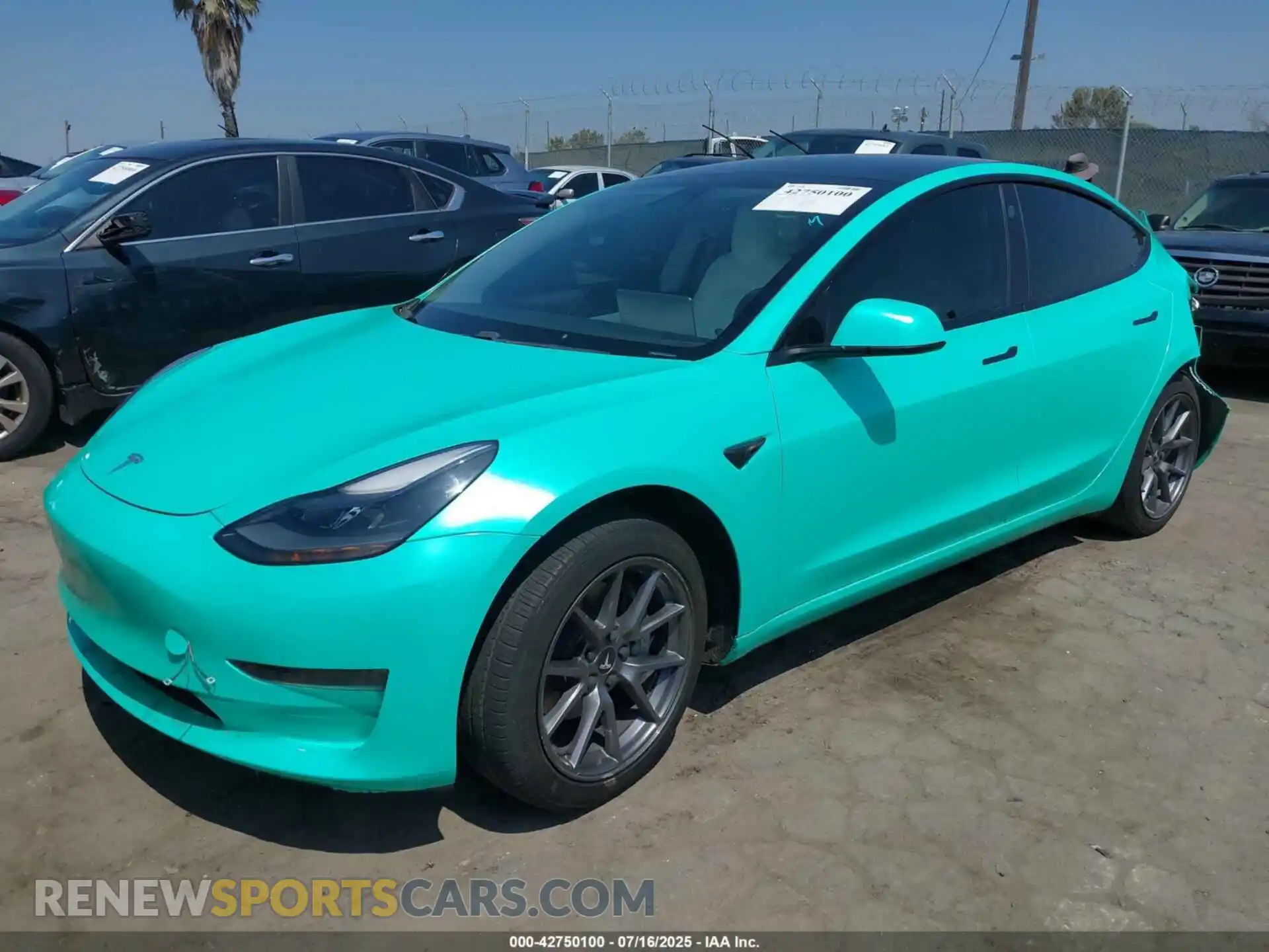 2 Photograph of a damaged car 5YJ3E1EA1MF921673 TESLA MODEL 3 2021