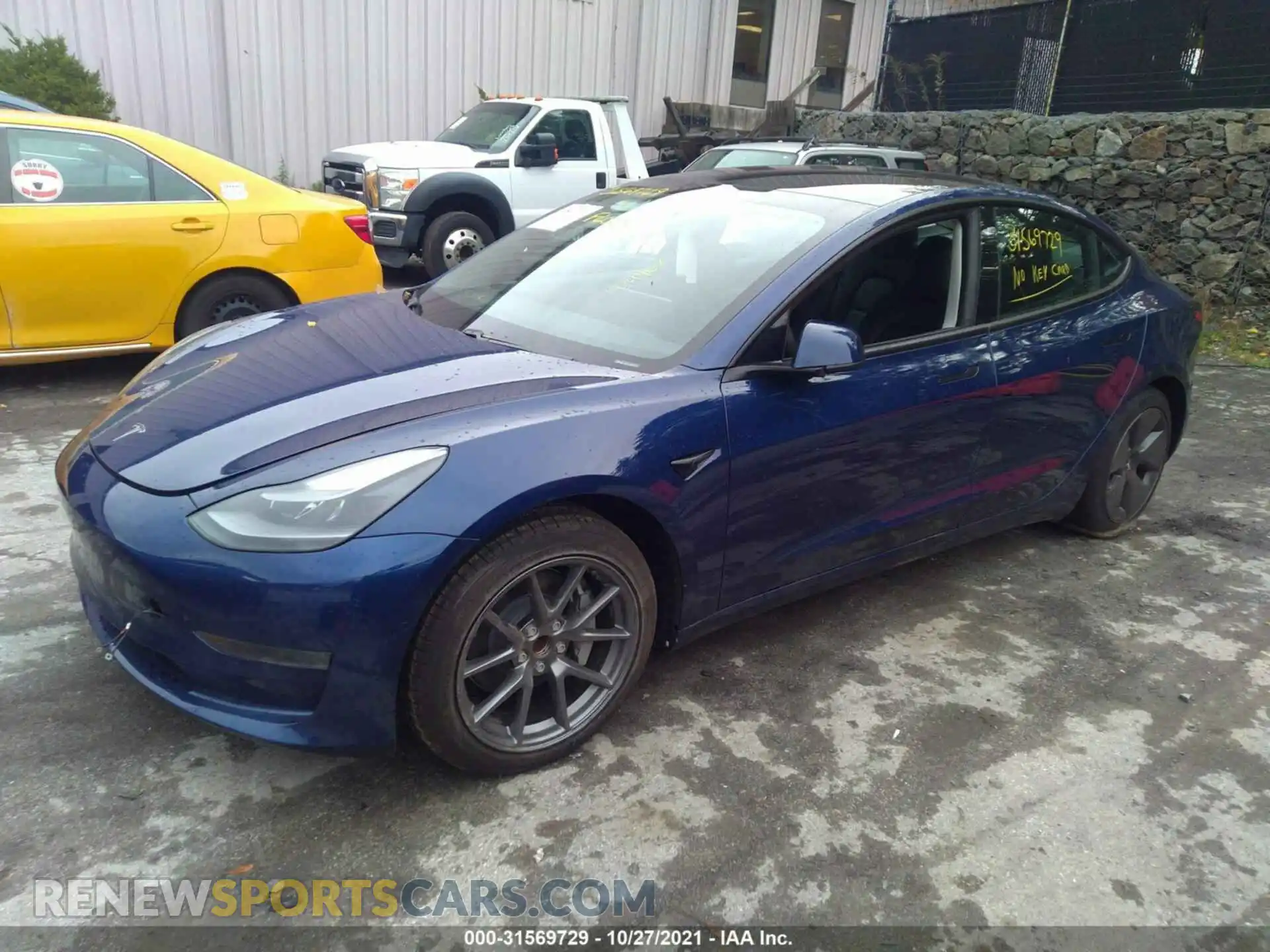 2 Photograph of a damaged car 5YJ3E1EA1MF922161 TESLA MODEL 3 2021