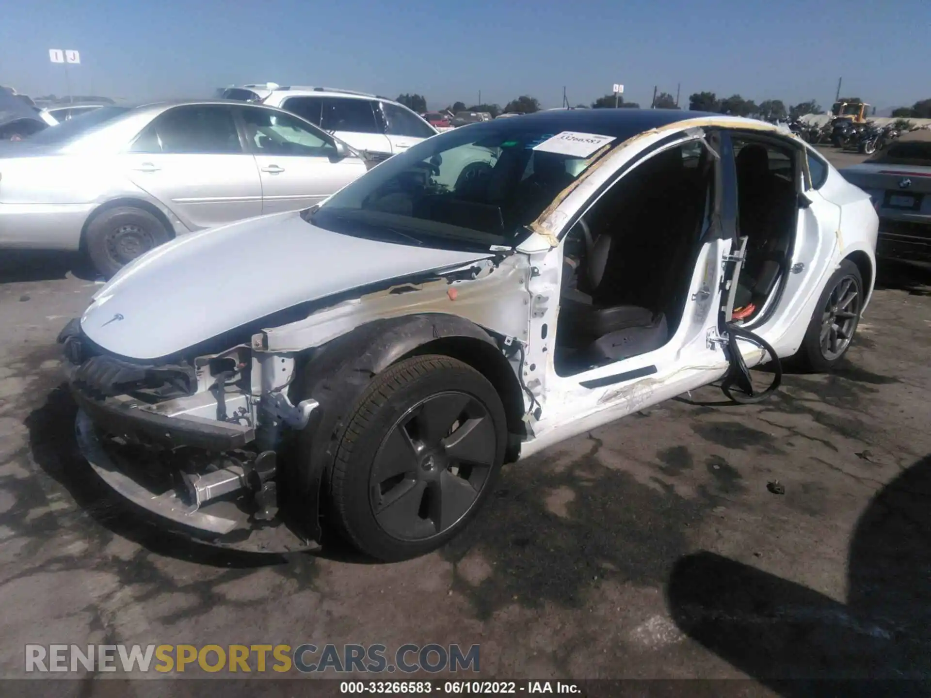 2 Photograph of a damaged car 5YJ3E1EA1MF929708 TESLA MODEL 3 2021