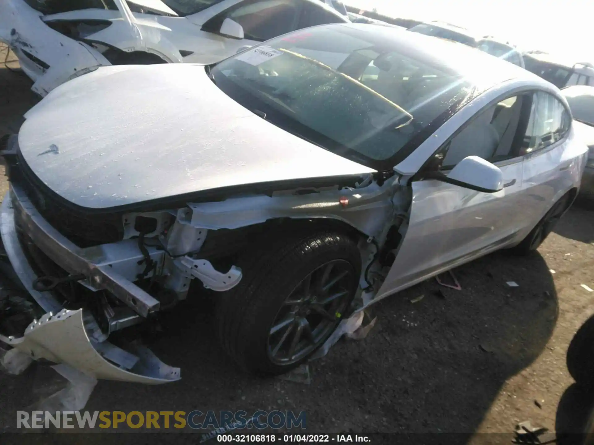 2 Photograph of a damaged car 5YJ3E1EA1MF938845 TESLA MODEL 3 2021