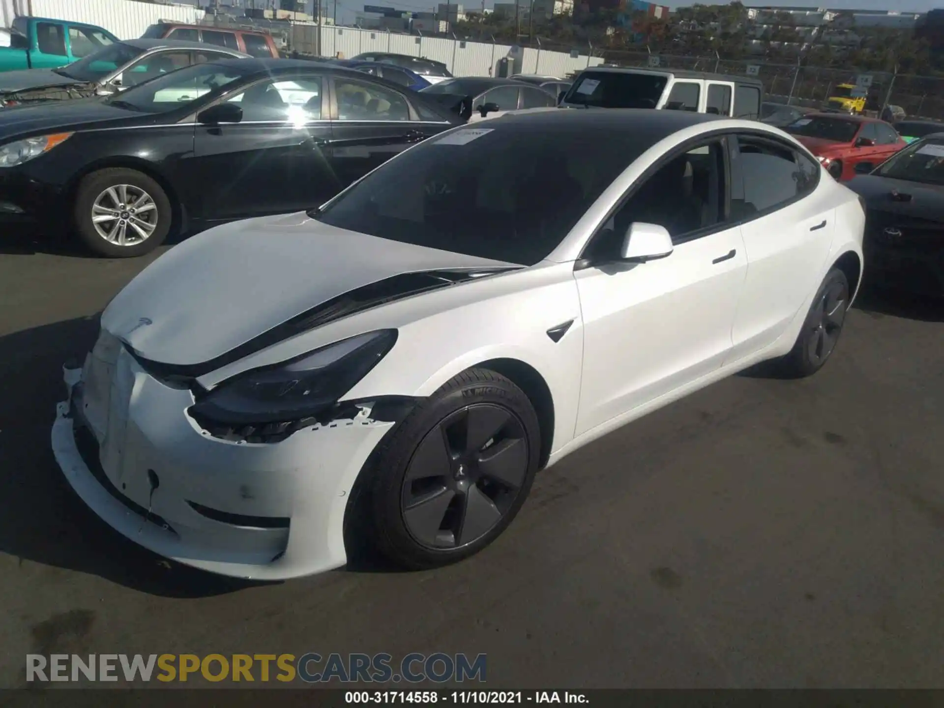 2 Photograph of a damaged car 5YJ3E1EA1MF996633 TESLA MODEL 3 2021