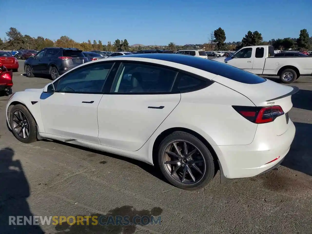 2 fotografías del automóvil dañado 5YJ3E1EA2MF051643 TESLA MODEL 3 2021