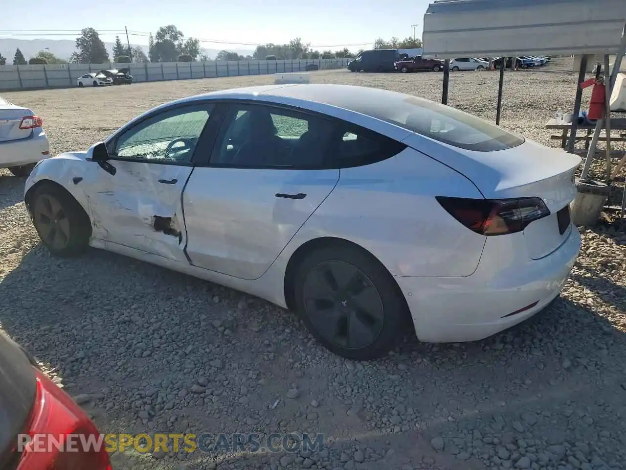 2 fotografías del automóvil dañado 5YJ3E1EA2MF074923 TESLA MODEL 3 2021