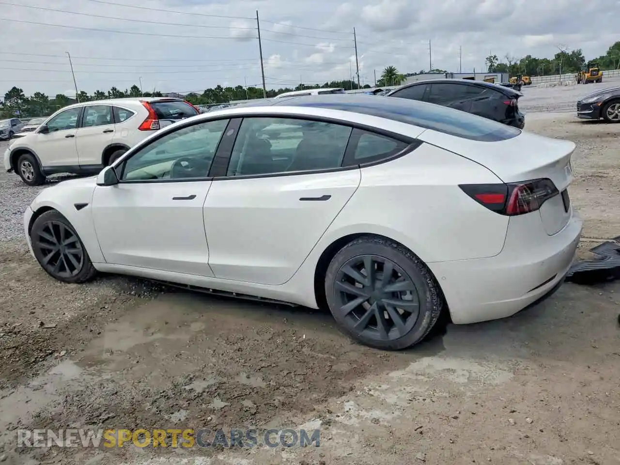 2 Photograph of a damaged car 5YJ3E1EA2MF086893 TESLA MODEL 3 2021