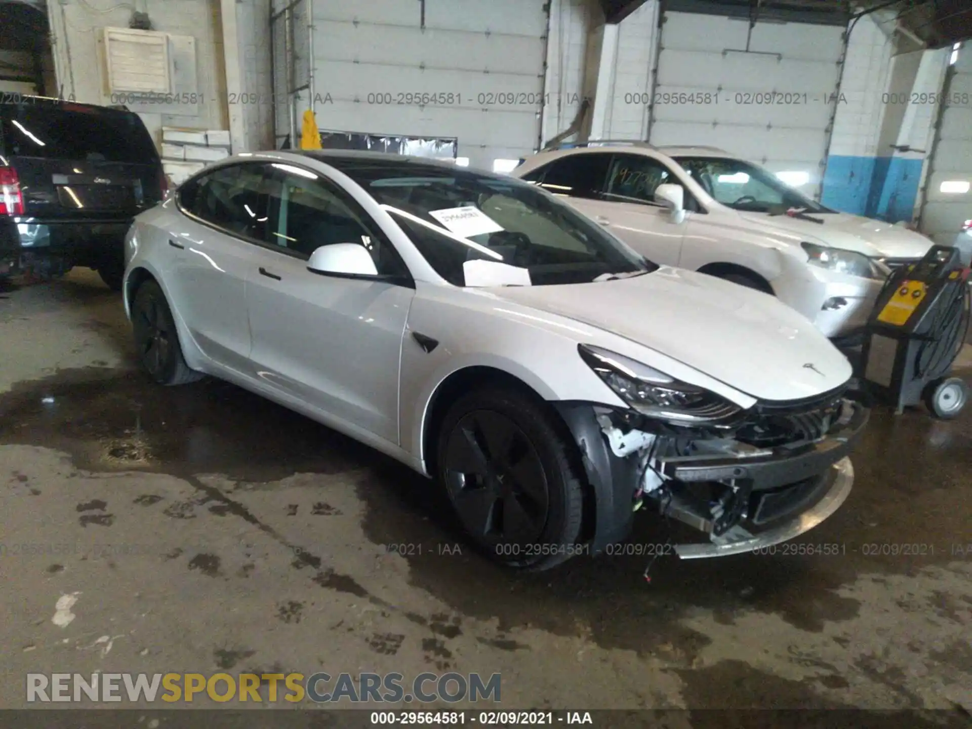 1 Photograph of a damaged car 5YJ3E1EA2MF850595 TESLA MODEL 3 2021