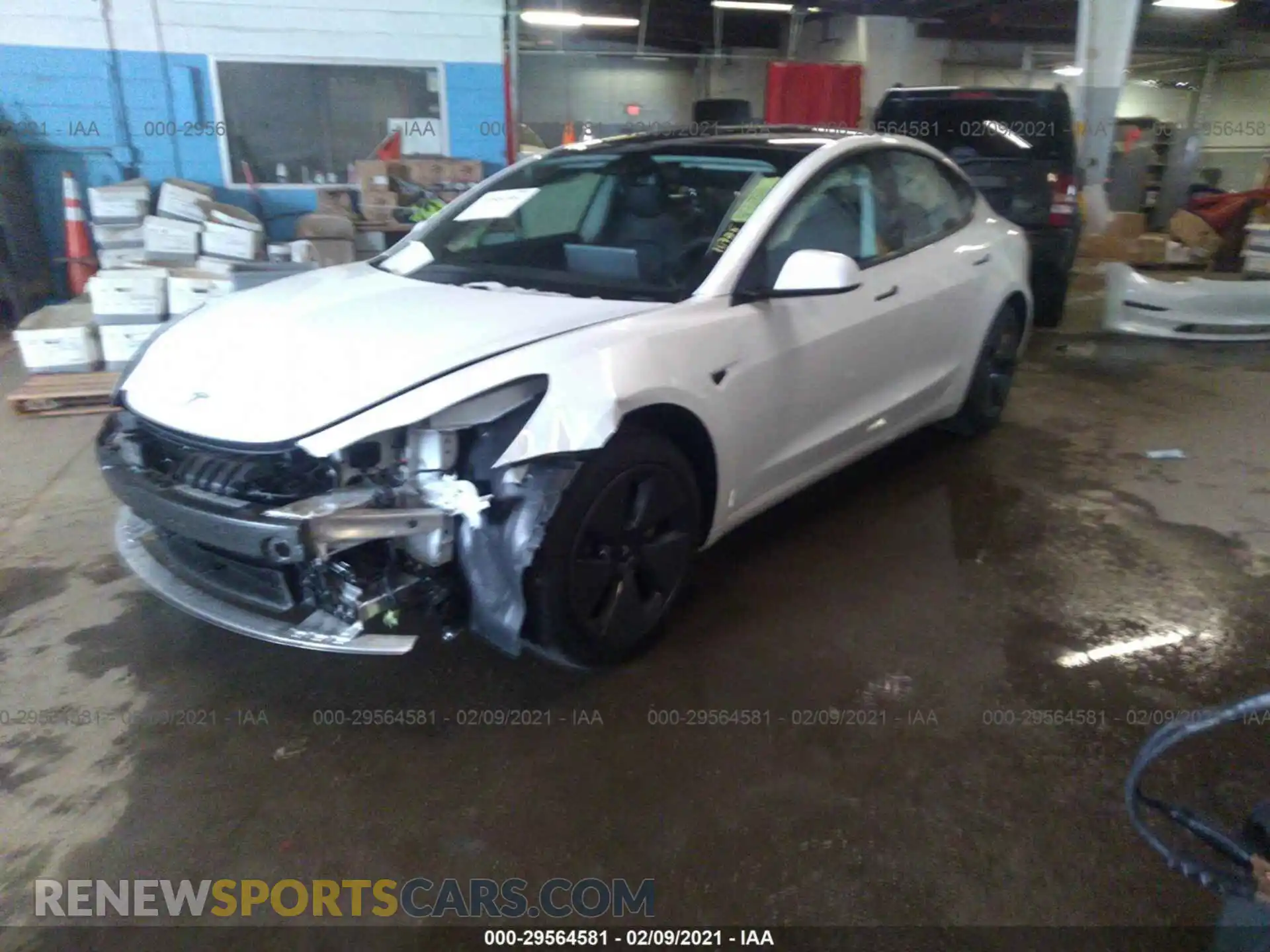 2 Photograph of a damaged car 5YJ3E1EA2MF850595 TESLA MODEL 3 2021