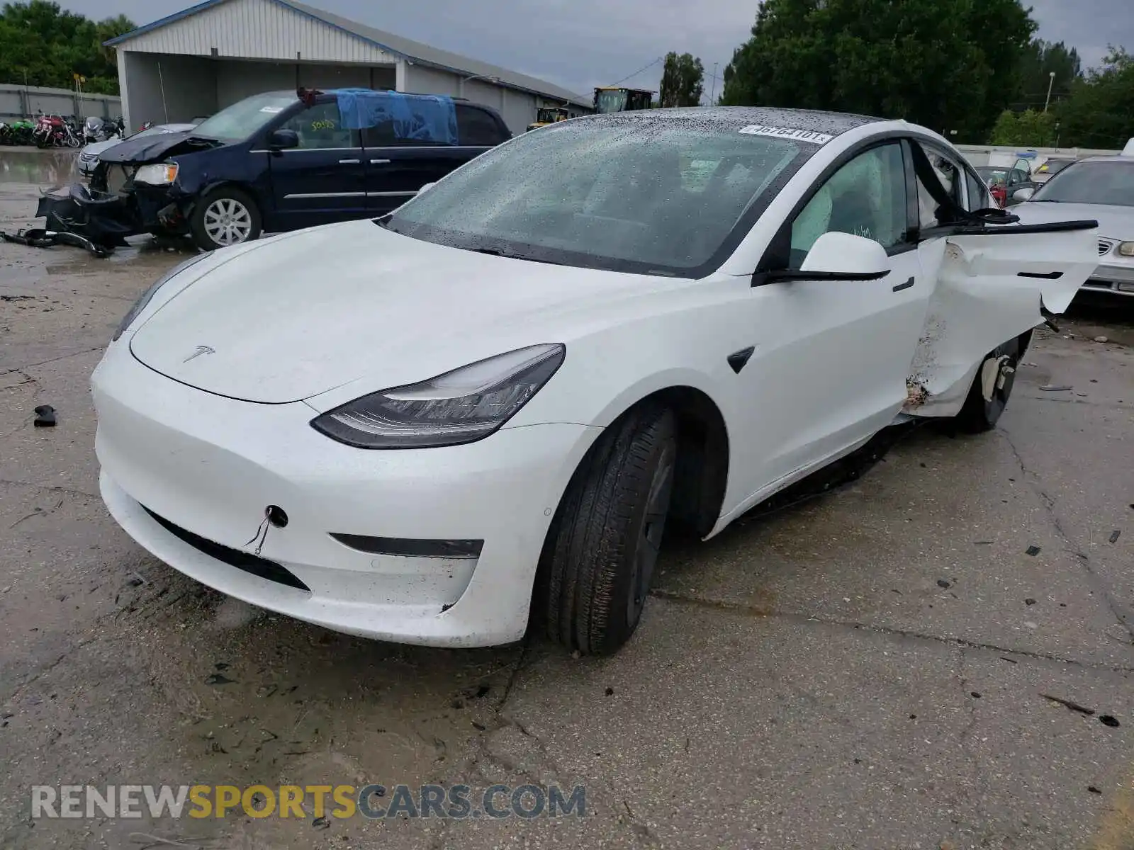2 fotografías del automóvil dañado 5YJ3E1EA2MF854999 TESLA MODEL 3 2021