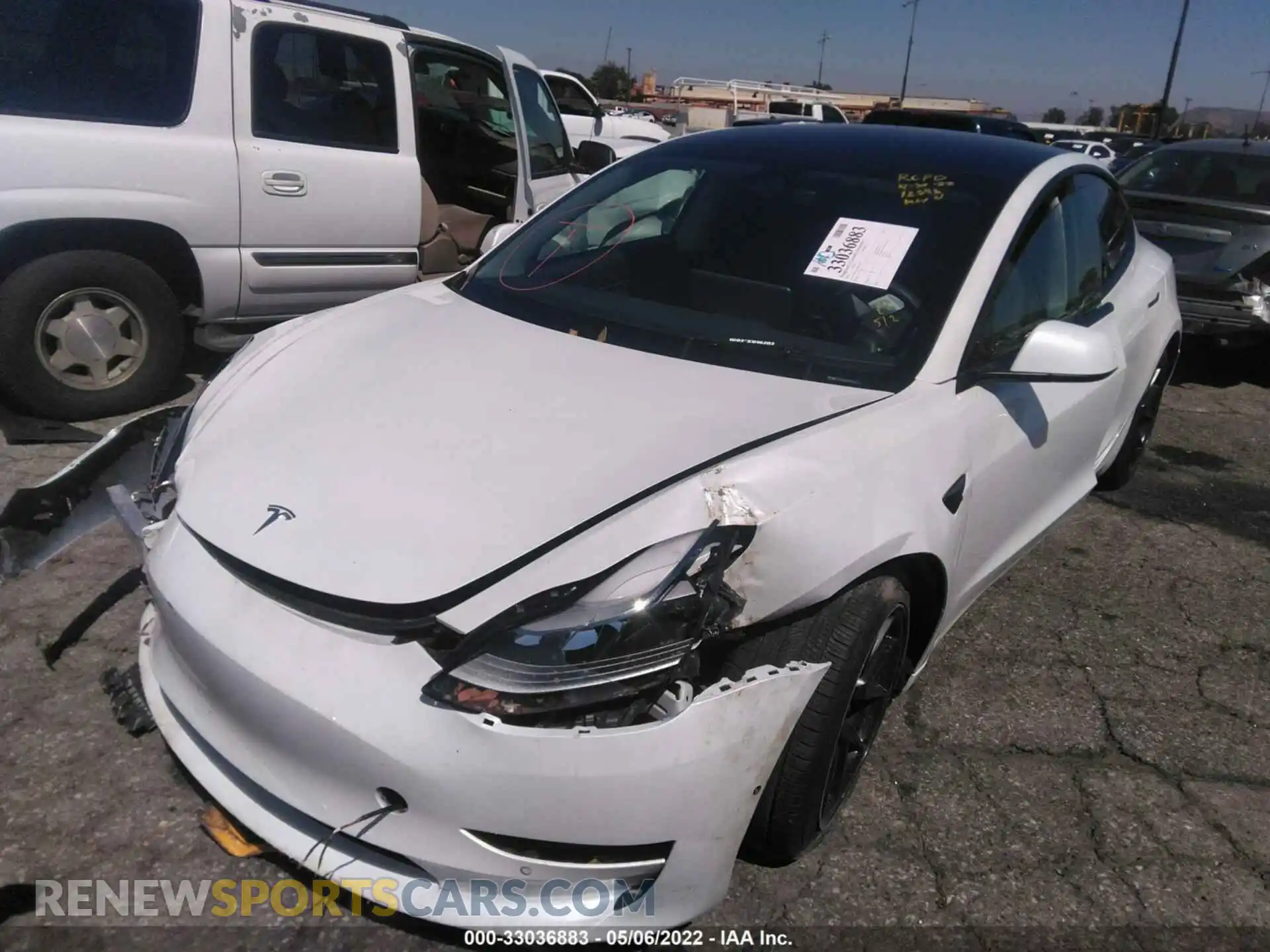 2 Photograph of a damaged car 5YJ3E1EA2MF874217 TESLA MODEL 3 2021