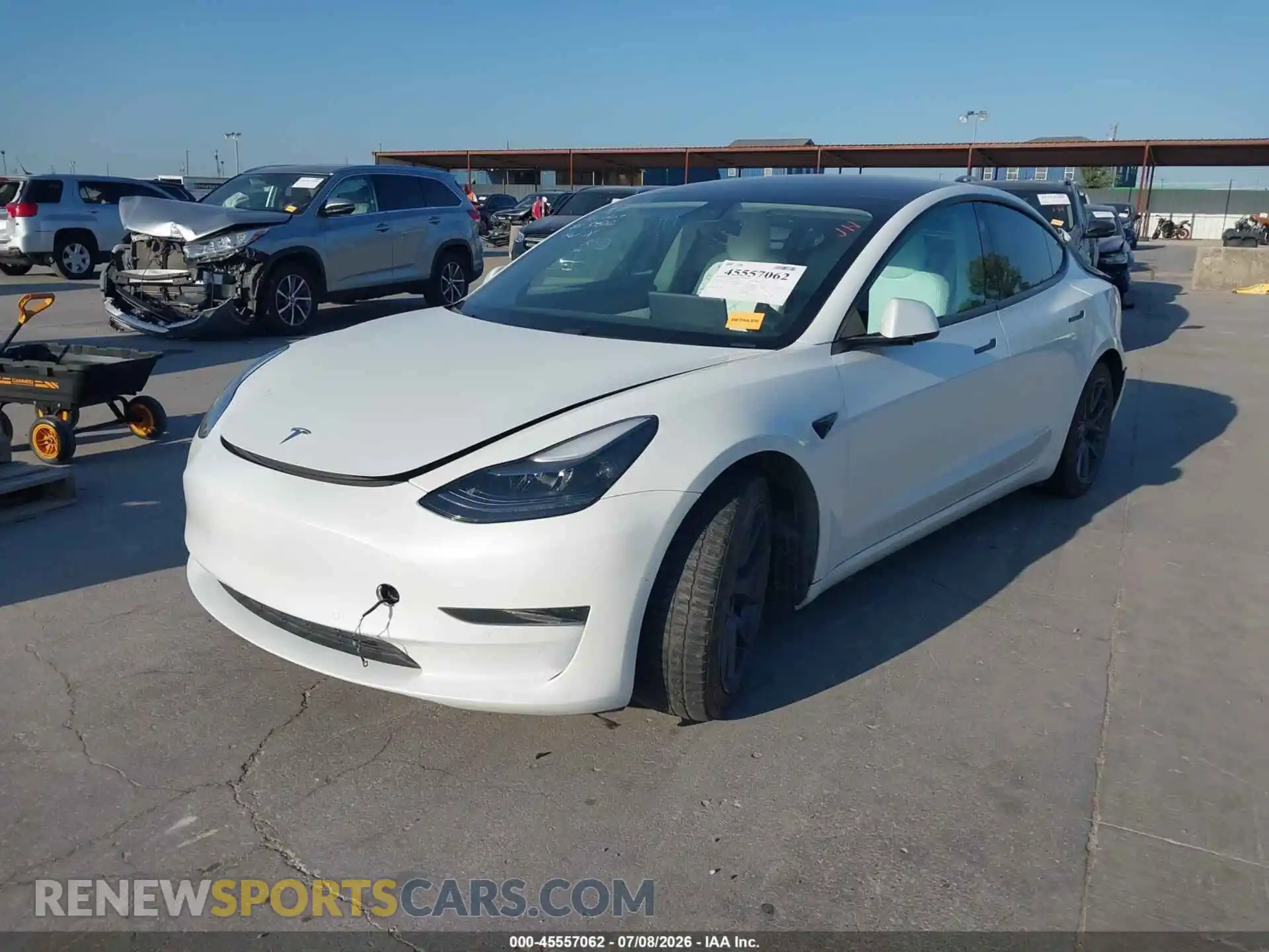 2 fotografías del automóvil dañado 5YJ3E1EA2MF917325 TESLA MODEL 3 2021